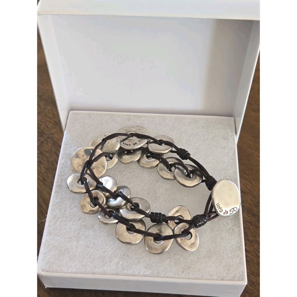 Uno De 50 Silver Plated Alloy Disc "Knock On Wood" 2 Strand Leather Bracelet 7"